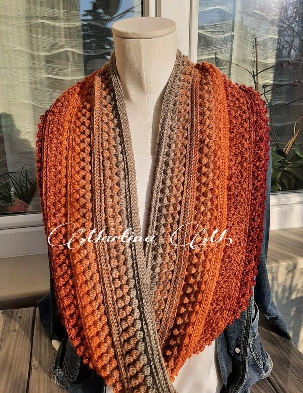 Ombré crocheted loop scarf with bobble stitch on mannequin