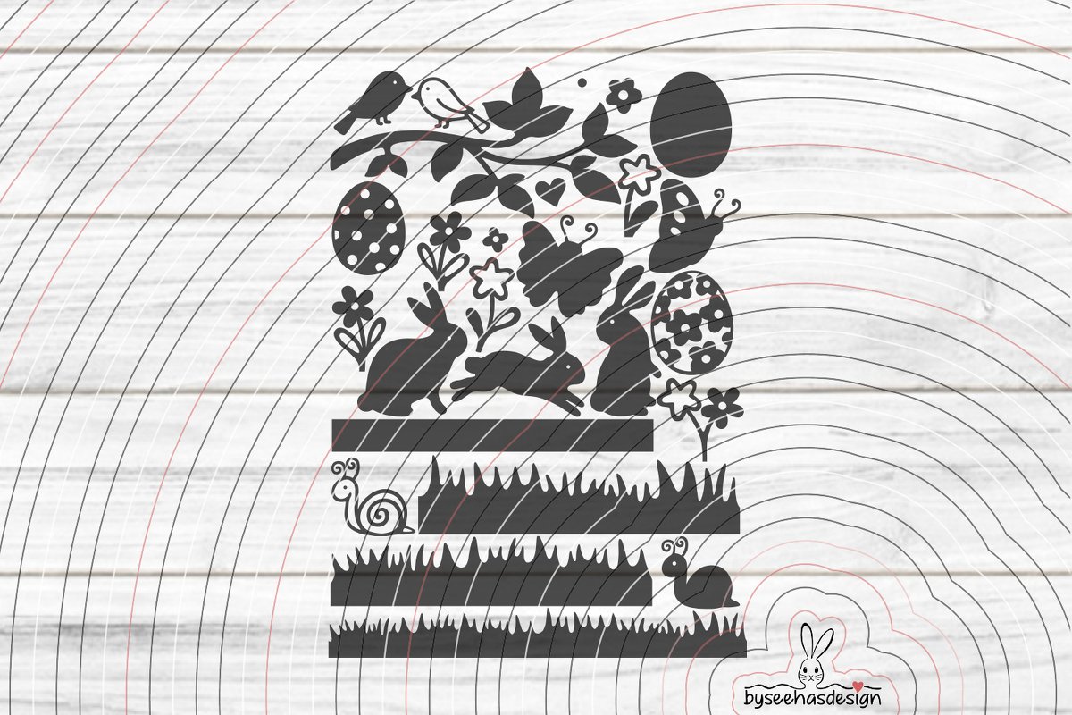Schwarze Silhouetten mit separaten Elementen: Hasen, gestufte Grasstreifen, Ostereier, Blumen, Vögel, Schmetterlinge und Schnecken auf hellem Holz.