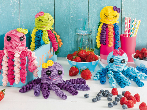 Niedliche, bunte Oktopusse