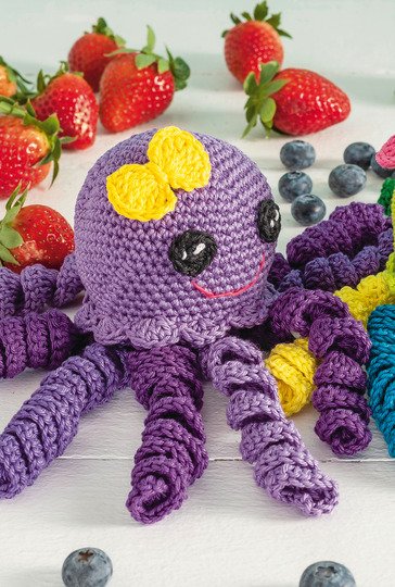 Niedliche, bunte Oktopusse