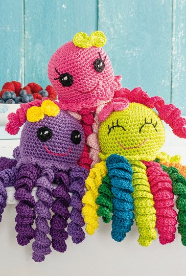 Niedliche, bunte Oktopusse