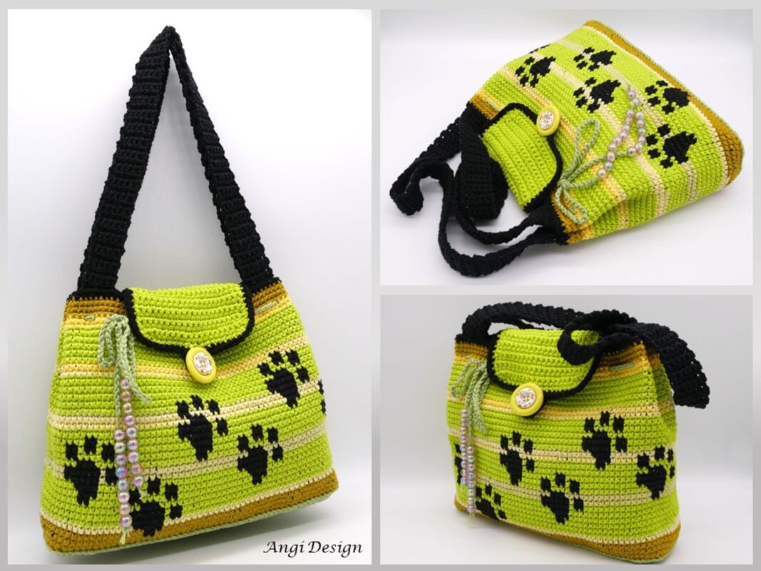 Gehäkelte hellgrüne Tasche mit schwarzen Pfoten, schwarzem Henkel und Knopfklappe