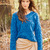 Blauer Pullover mit Rautenmuster