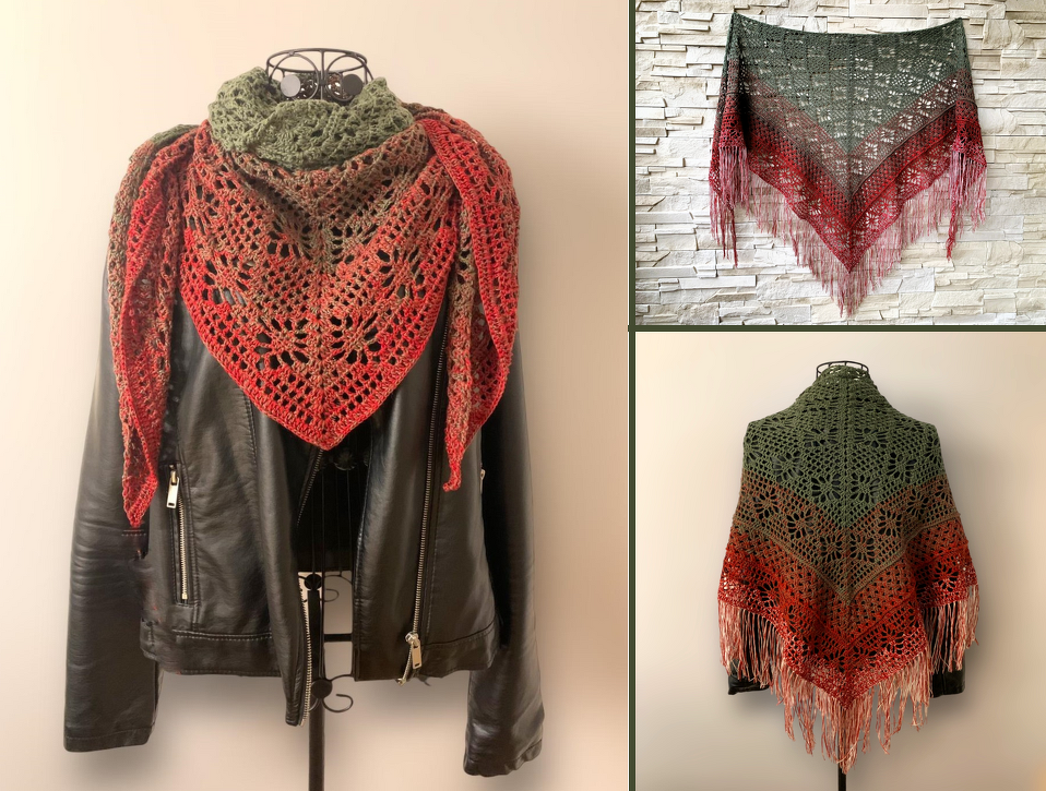 Triangle crochet shawl with green-to-red gradient, floral lace pattern and long fringe, draped on a mannequin and over a jacket