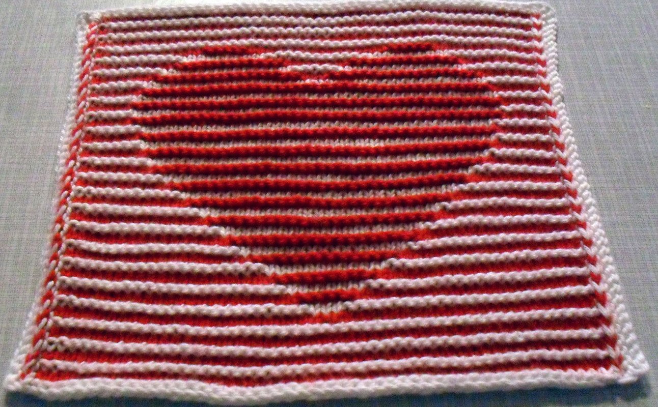 Herz als Spüli in Schattenstricktechnik mit besonderem Rand