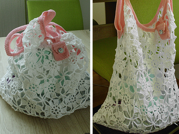 Weiße gehäkelte Netztasche aus Blütenmotiven mit rosafarbener Einfassung und Trägern, Zierlasche mit Knopf