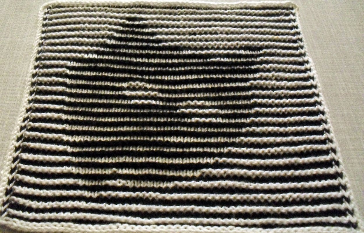 Katze in Schattenstricktechnik als Spüli oder Deko mit dem besonderen Rand