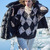 Rautenpulli in Beige und Schwarz