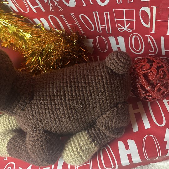 Crochet pattern for a lying reindeer amigurumi
