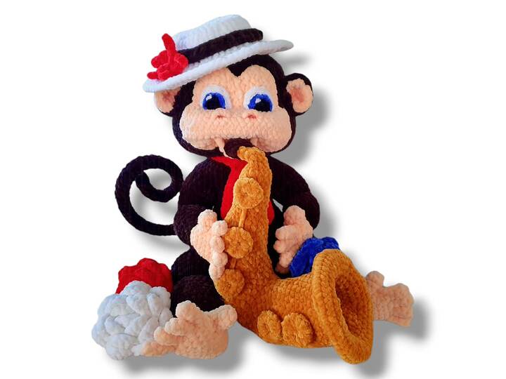 Häkelanleitung Monty der musikalische Affe