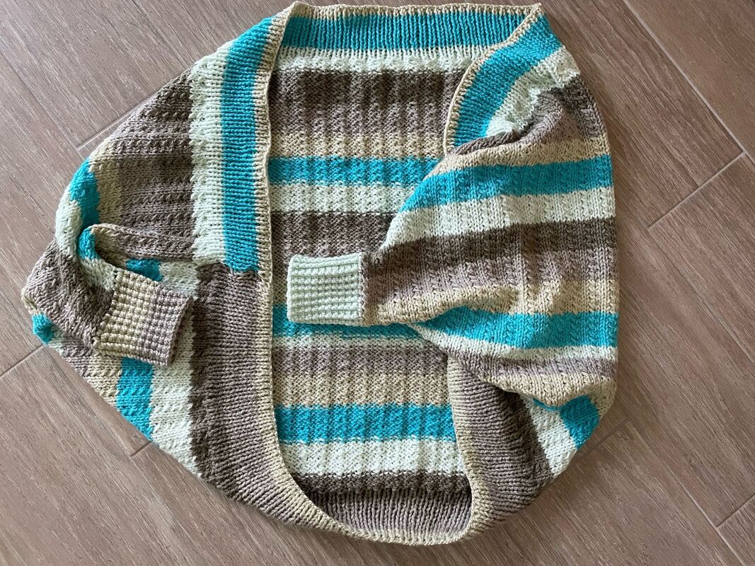 Strickanleitung für einen gemütlichen Seelenwärmer mit kleinem Zopfmuster - Bild 3