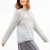 Pulli mit Ajourmusterpasse in Hellgrau