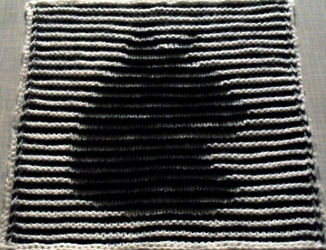 Katzenkopf als Spüli in Schattenstricktechnik mit dem besonderen Rand