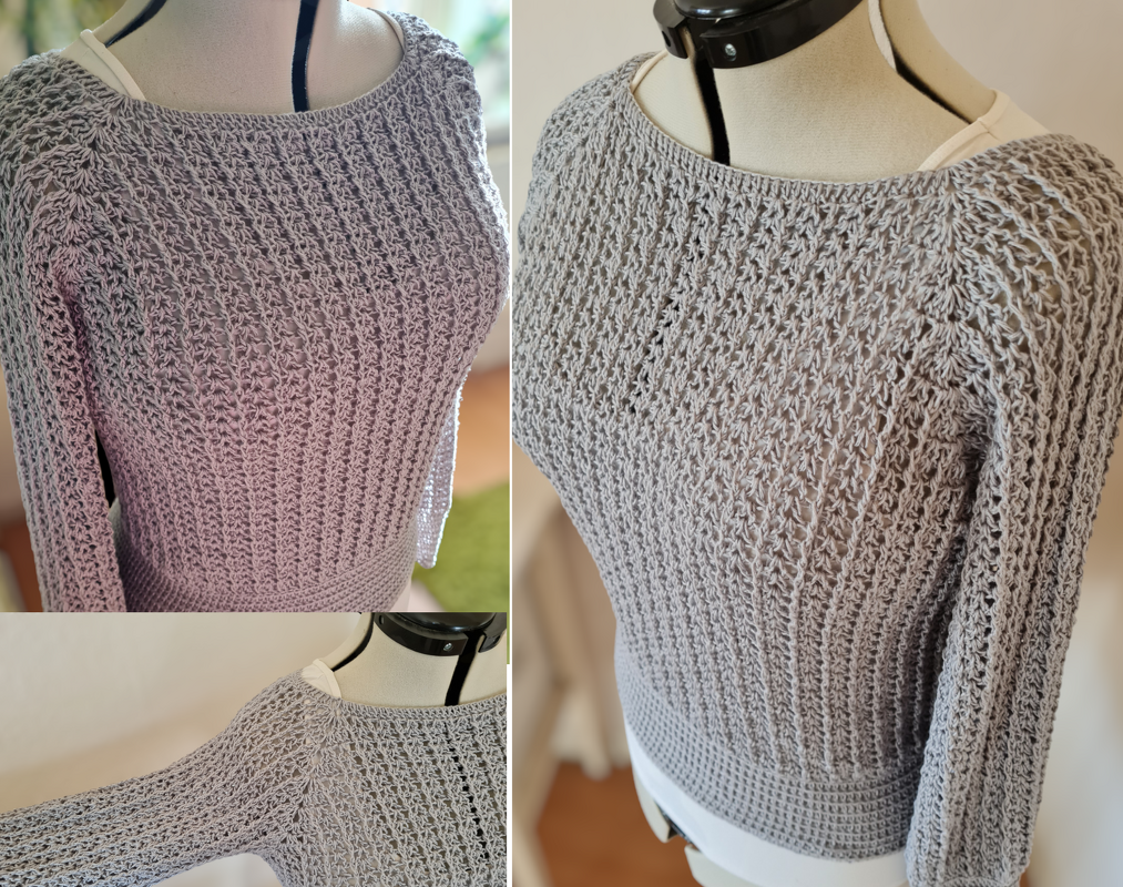 Gehäkelter grauer Damenpullover mit Lochmuster und langen Ärmeln auf Schneiderpuppe