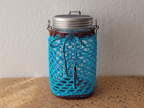 Sonnenglas schön umhäkelt