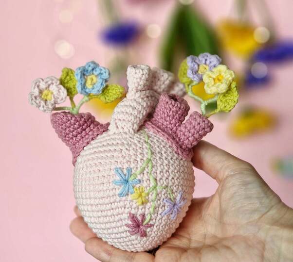 Crochet forget - me - not flowers bouquet in anatomical heart vase