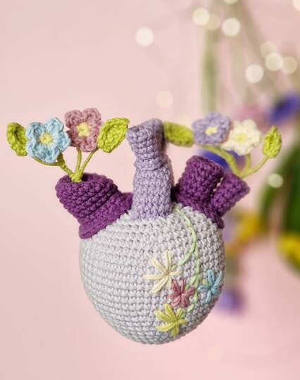 Crochet forget - me - not flowers bouquet in anatomical heart vase