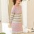 Kleid in Rosa mit Wellenmuster in Weiß und Sand