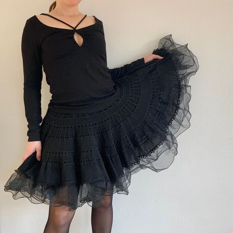 Black full-circle crochet skirt with scalloped stitch panels and sheer tulle trim