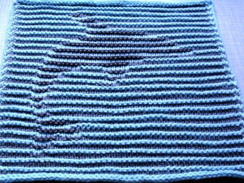 Delphin in Schattenstricktechnik mit dem besonderen Rand