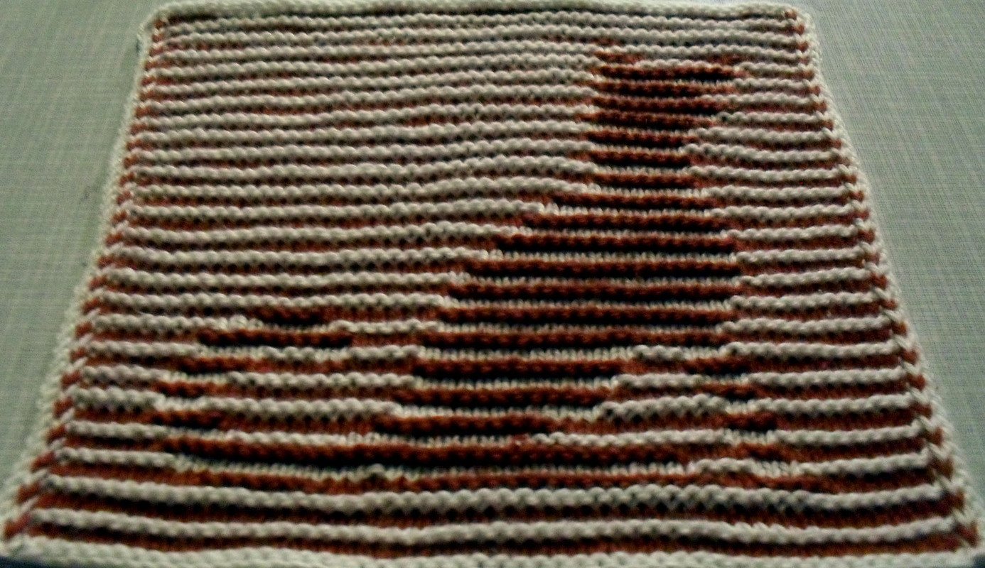 Hund in Schattenstricktechnik als Spüli oder Pfotentuch