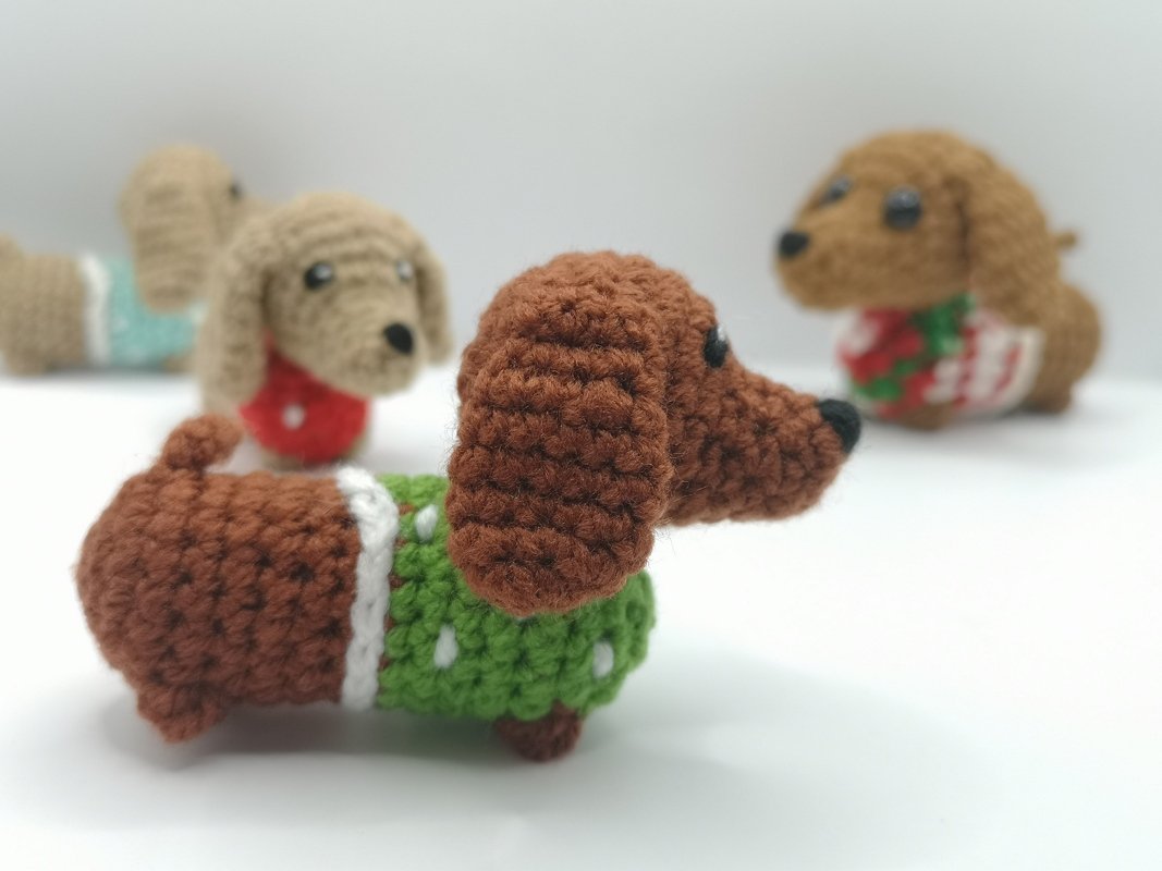 Little Dachshund in sweater - crochet pattern by NiggyArts