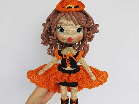 Astrid in Halloween outfit, the doll in the dress