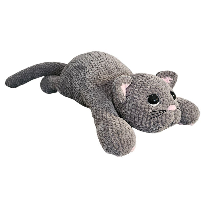 Grey crocheted amigurumi cat plush toy lying down with black eyes and pink accents.