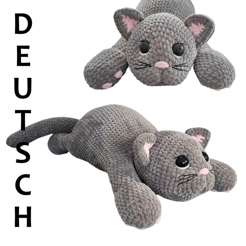 Studio reference photo of a gray crocheted reclining cat showing ear, paw and face details