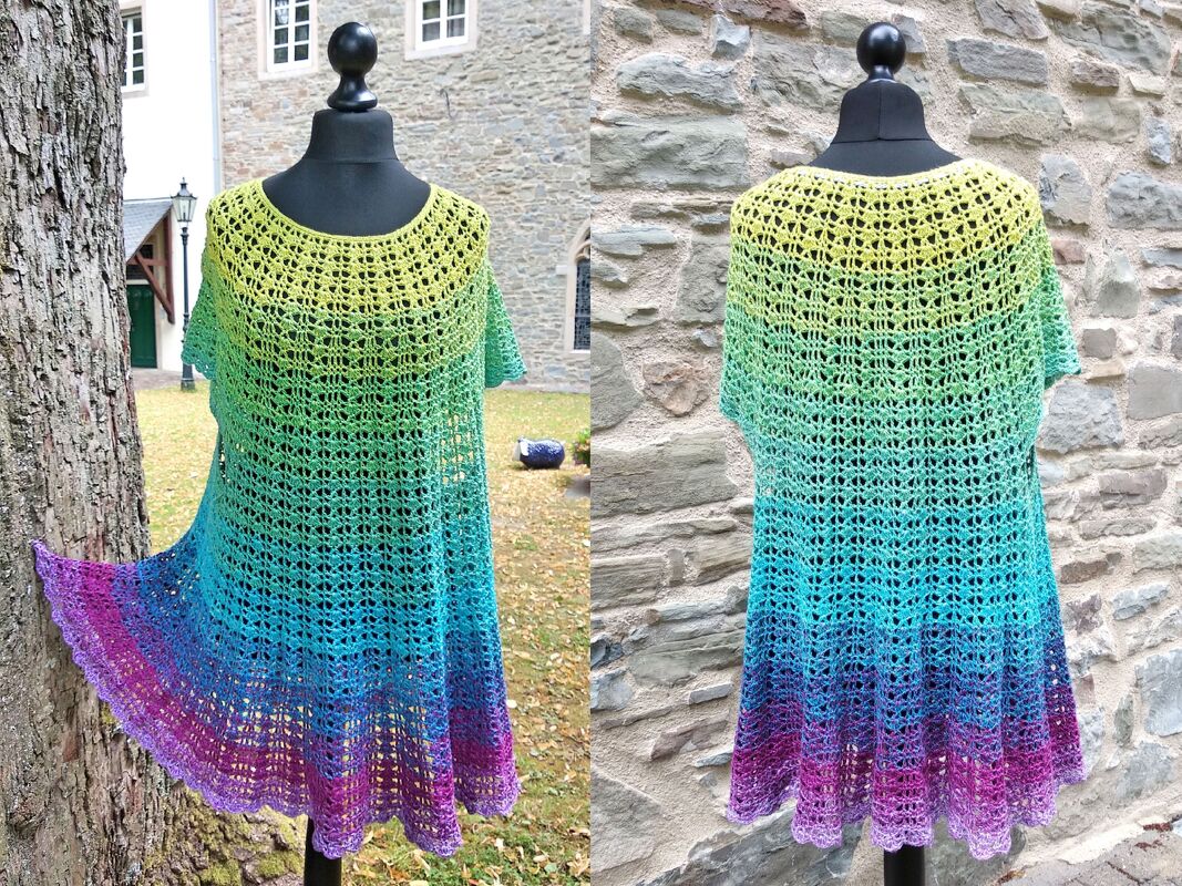 Front and back view of a rainbow ombre crocheted women's tunic with short sleeves and scalloped flared hem on a mannequin.