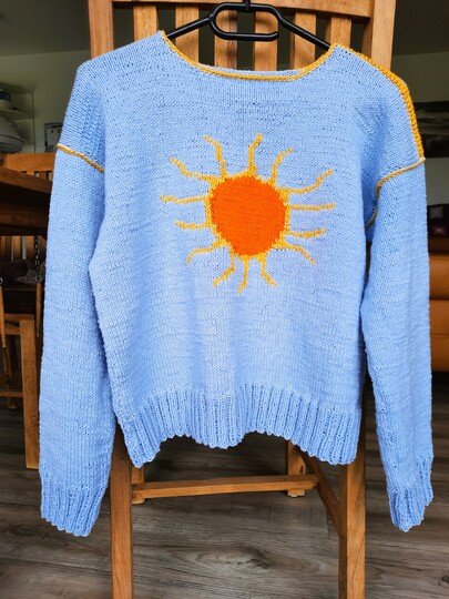 Pullover mit Sonnenmotiv Größe 36 bis 42 , Strickanleitung