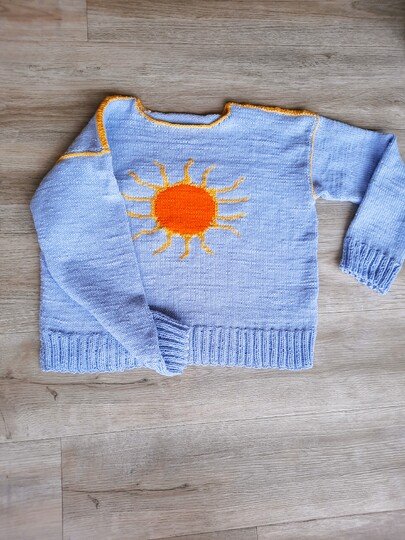 Pullover mit Sonnenmotiv Größe 36 bis 42 , Strickanleitung