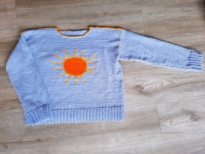 Pullover mit Sonnenmotiv Größe 36 bis 42 , Strickanleitung