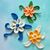 Blume mit Blättern und Ranken – Häkelanleitung für Deko & Applikation