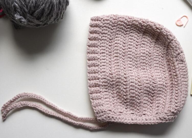 Häkelanleitung für die schützende Babymütze
