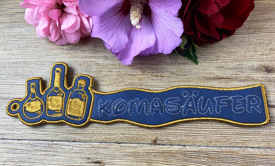 Stickdatei 3D-Anhänger KOMASÄUFER, Maschinenstickdatei