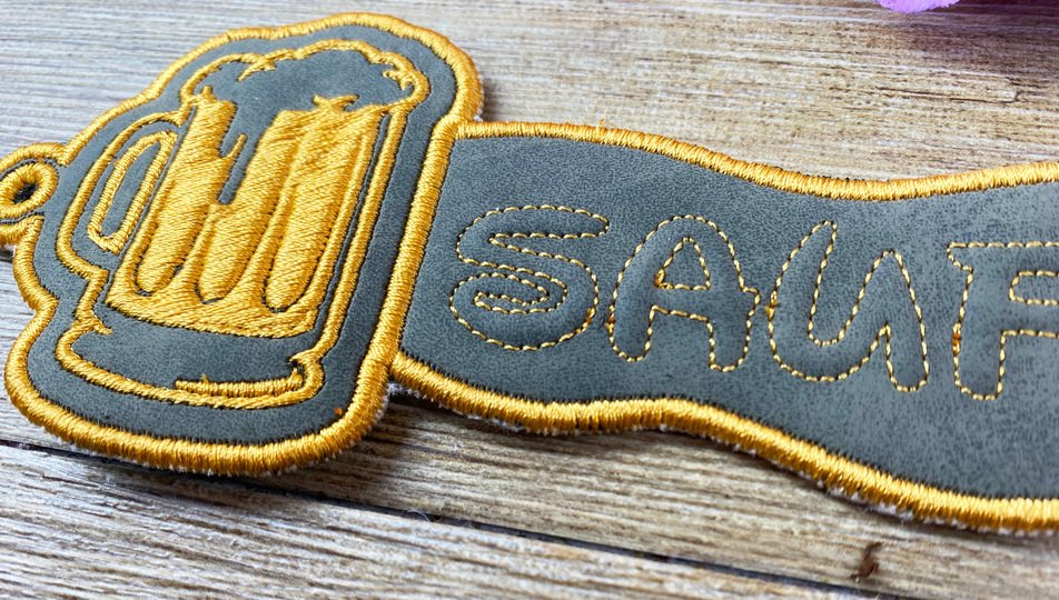 Stickdatei 3D-Anhänger SAUFBRUDI, Maschinenstickdatei