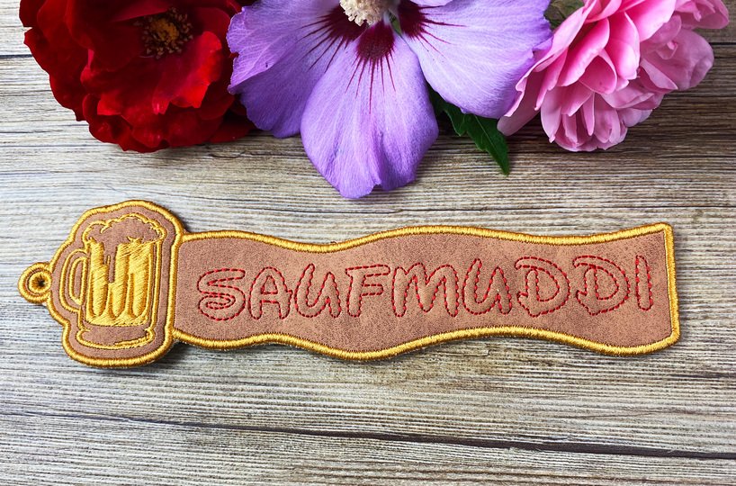 Stickdatei 3D-Anhänger SAUFMUDDI, Maschinenstickdatei