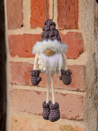 kleiner Wichtel mit Baumelbeinen zum Hängen oder Stellen Frühling