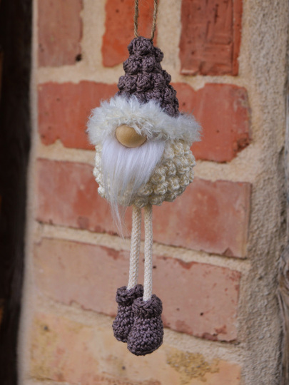 kleiner Wichtel mit Baumelbeinen zum Hängen oder Stellen Frühling