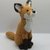 realistic fox (sitting) - crochet pattern by NiggyArts