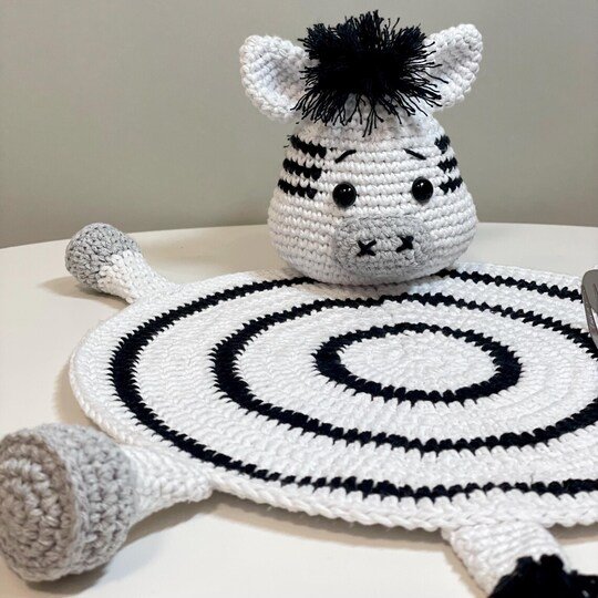 Häkelanleitung Zebra Platzset für Baby-Dekoration