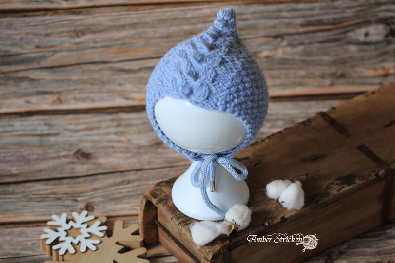 Dragon hat/bonnet knitted in a cable pattern with bobbles No. 008