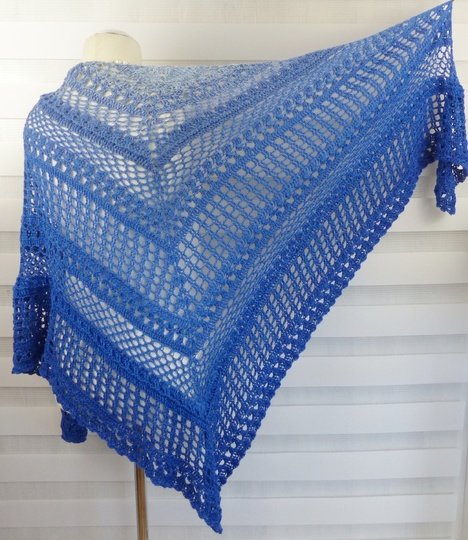 Crochet pattern for the happy time shawl, a light and airy triangular shawl
