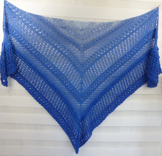 Crochet pattern for the happy time shawl, a light and airy triangular shawl