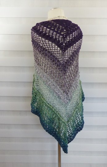 Crochet pattern for the happy time shawl, a light and airy triangular shawl