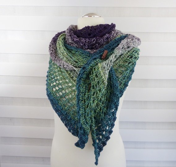 Crochet pattern for the happy time shawl, a light and airy triangular shawl