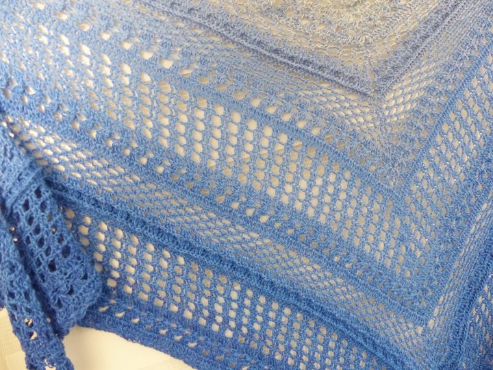 Crochet pattern for the happy time shawl, a light and airy triangular shawl