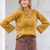 Raglanpullover mit Zopfmuster