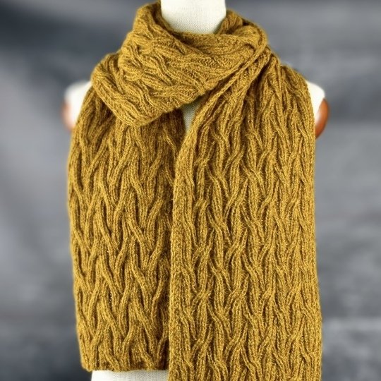 Wendewerk: Strickanleitung für einen Schal mit beidseitigem Zopfmuster